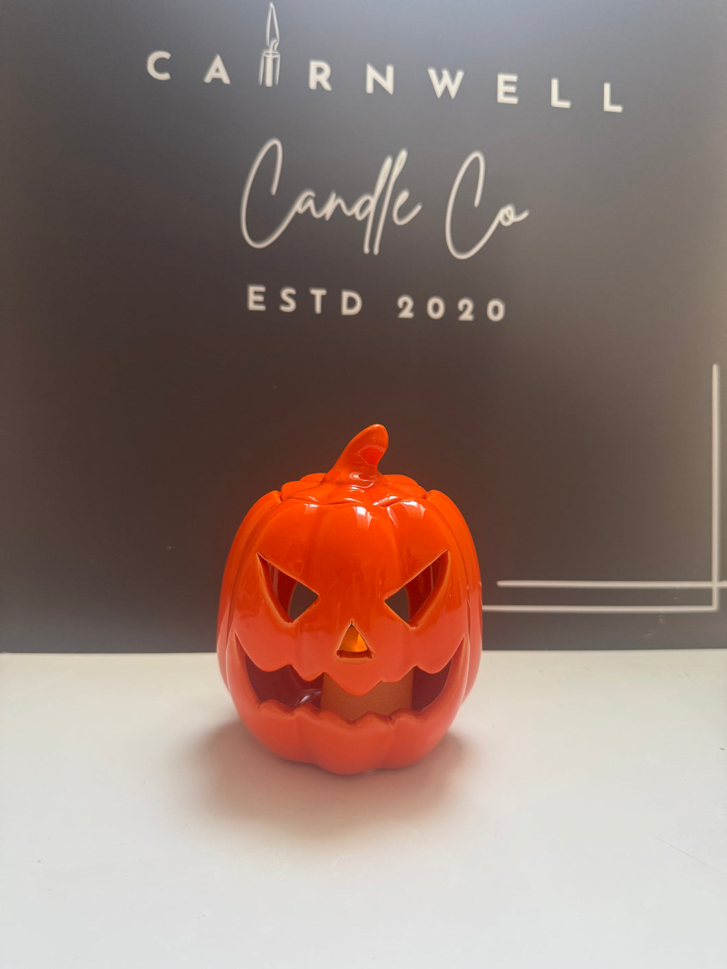 Orange pumpkin wax burner